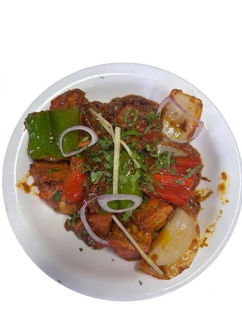 Plat amb pebrots i ceba publicat pel restaurant